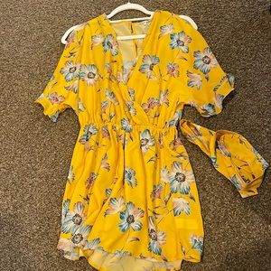 Charlotte Russe floral romper with open back (waist tie included)